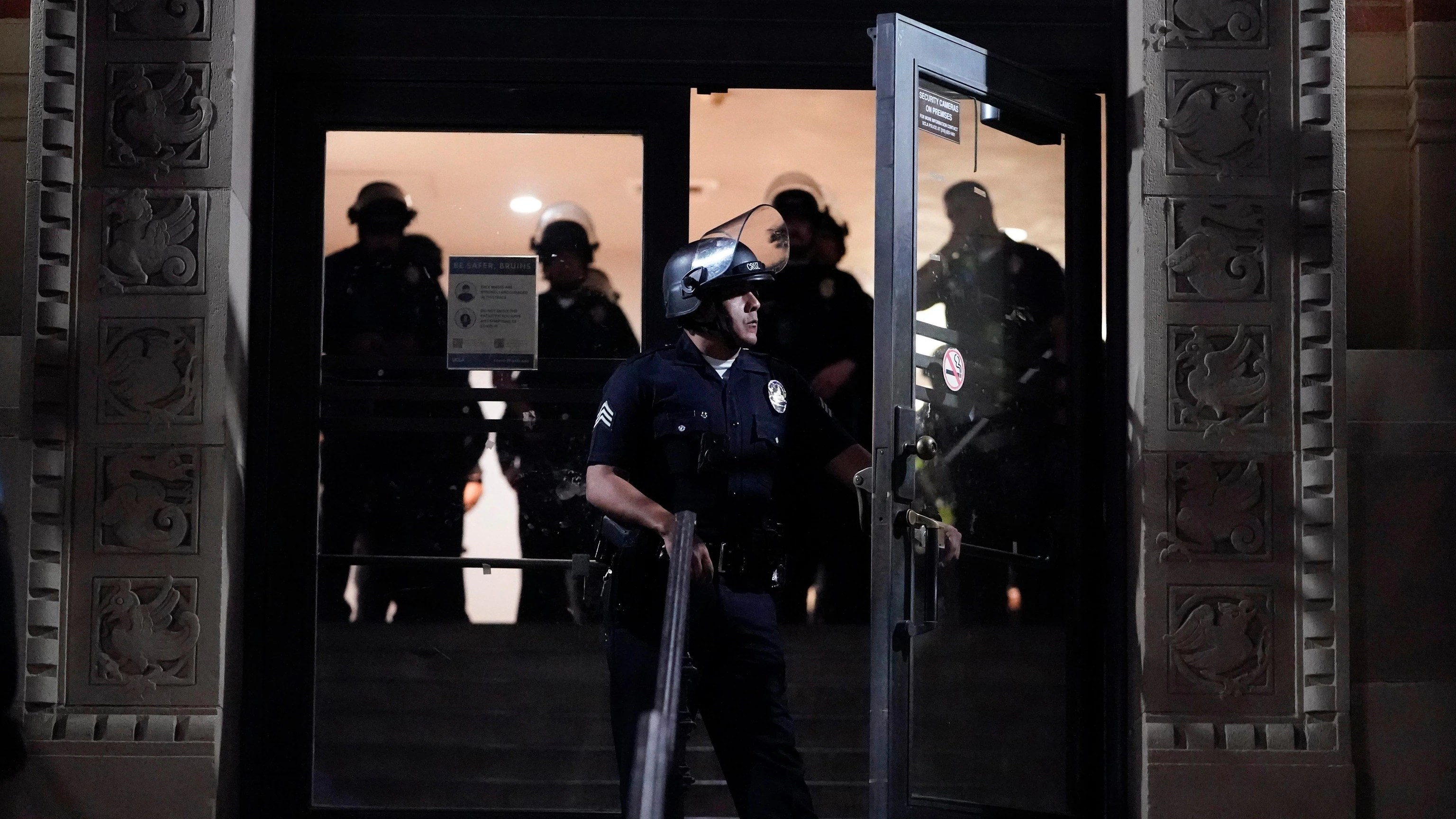 Hundreds of pro-Palestinian protesters remain on UCLA campus despite police ordering them to leave