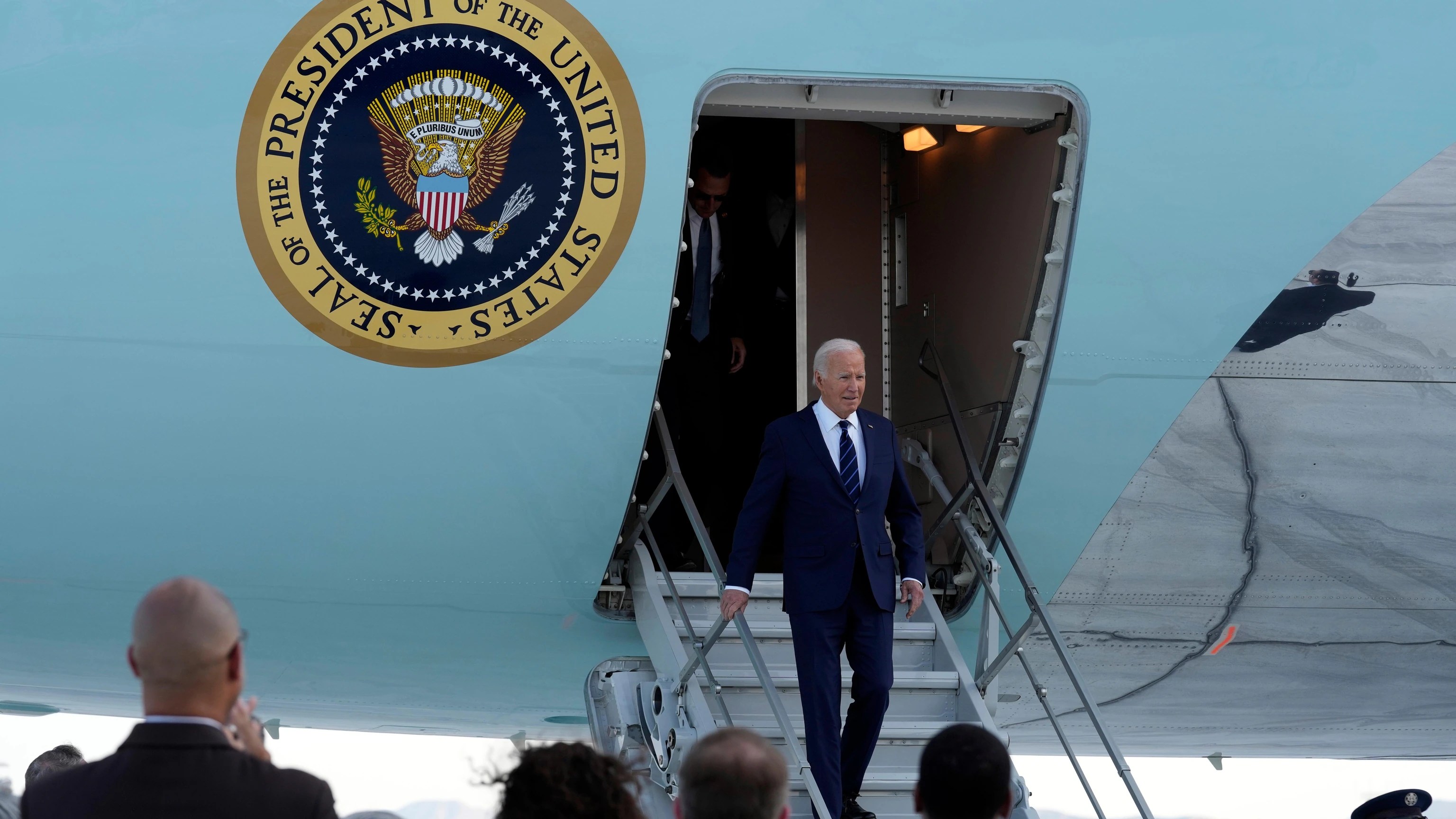 Biden is trying to sharpen the choice voters face in November as Republicans meet in Milwaukee