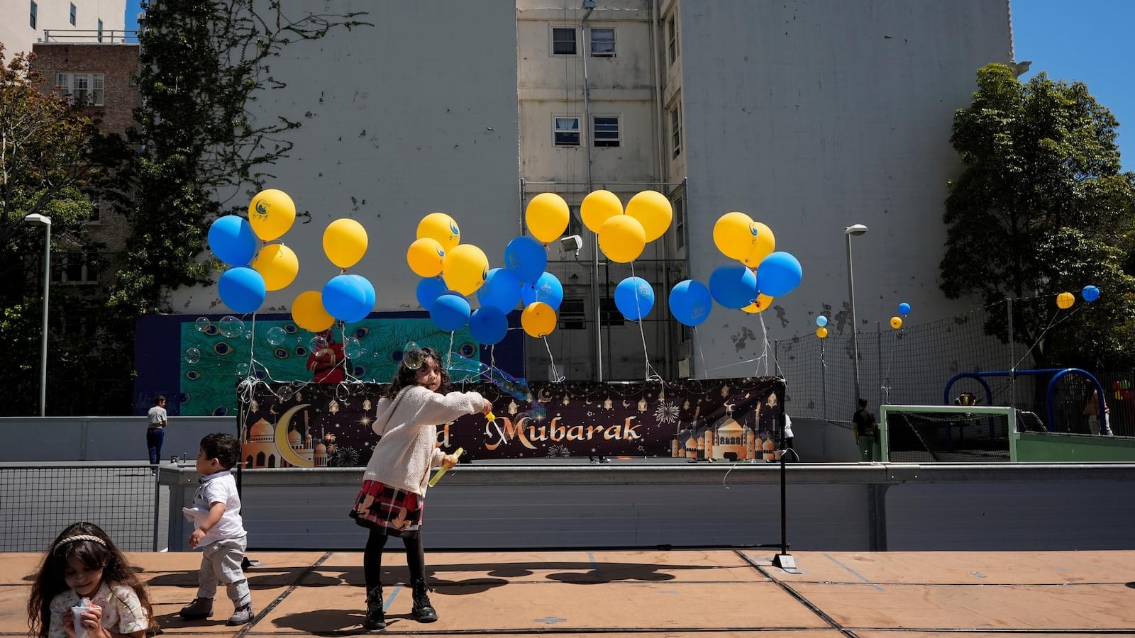 With a vest and a voice, helpers escort kids through San Francisco’s broken Tenderloin streets