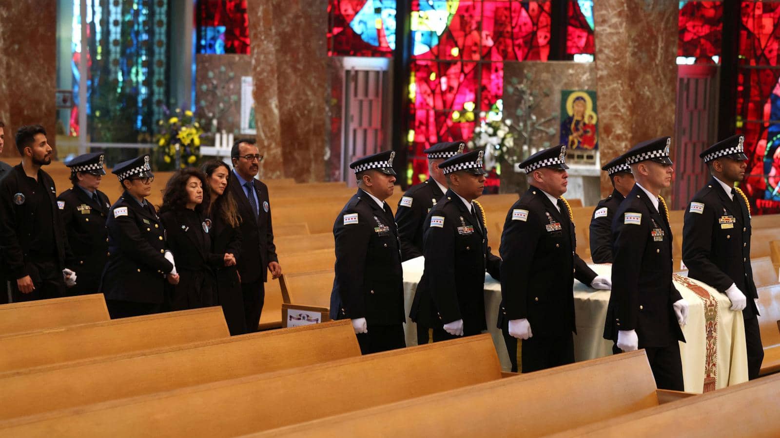 Funeral services are held for a Chicago police officer fatally shot while heading home from work