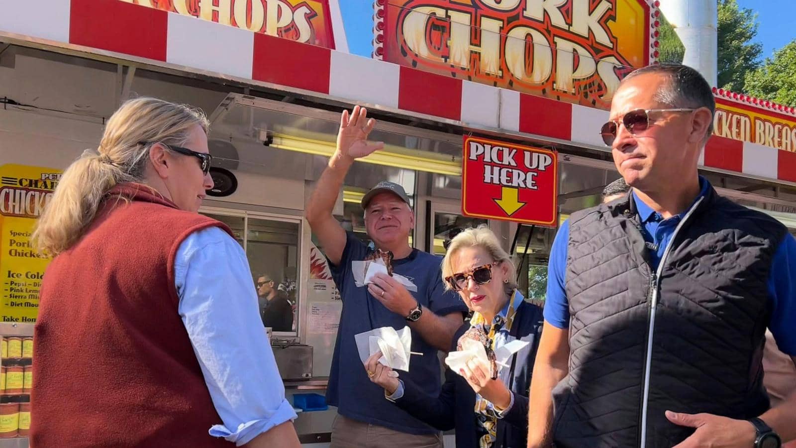 It’s a pork chop on a stick and a vanilla shake for Tim Walz at the Minnesota State Fair