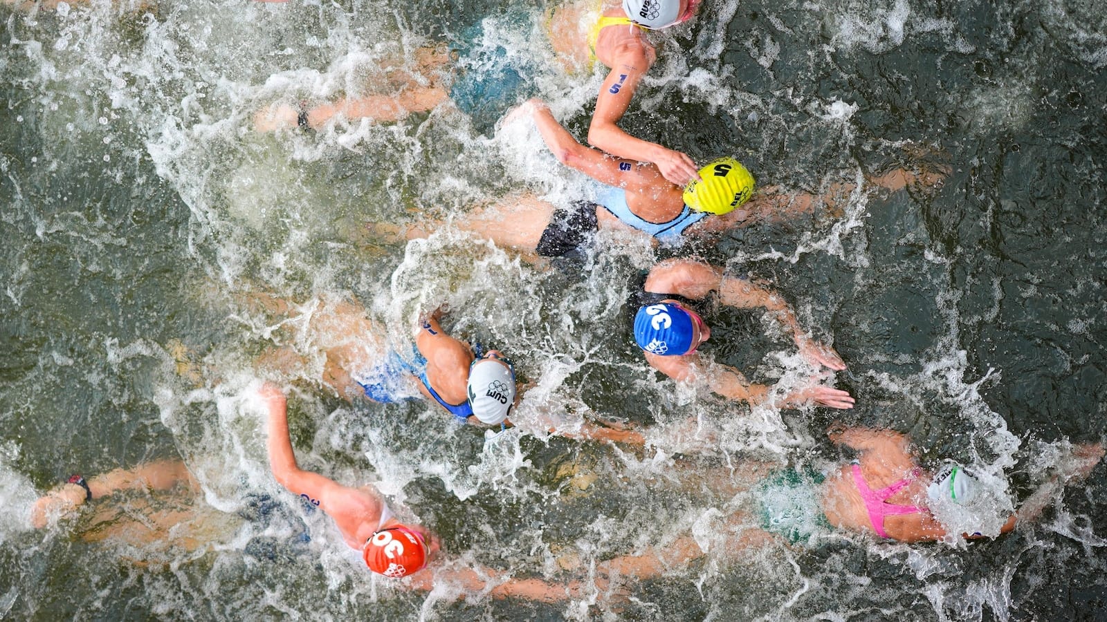 Belgium withdraws from mixed relay triathlon after athlete who swam in Seine River falls ill