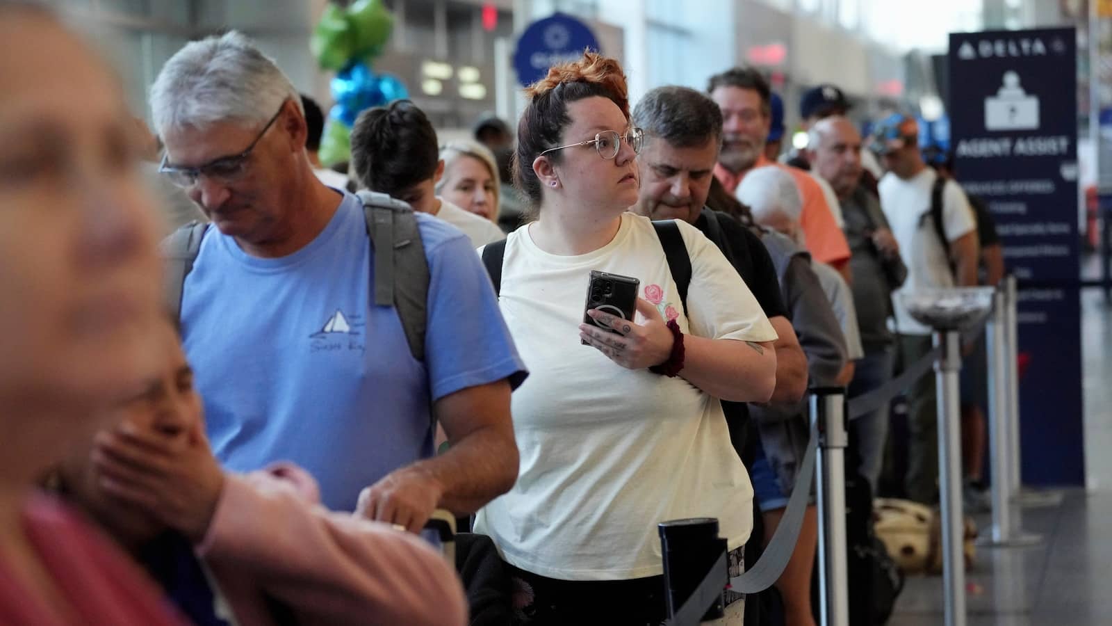 Delta Air Lines says cancellations continue as it tries to restore operations after tech outage