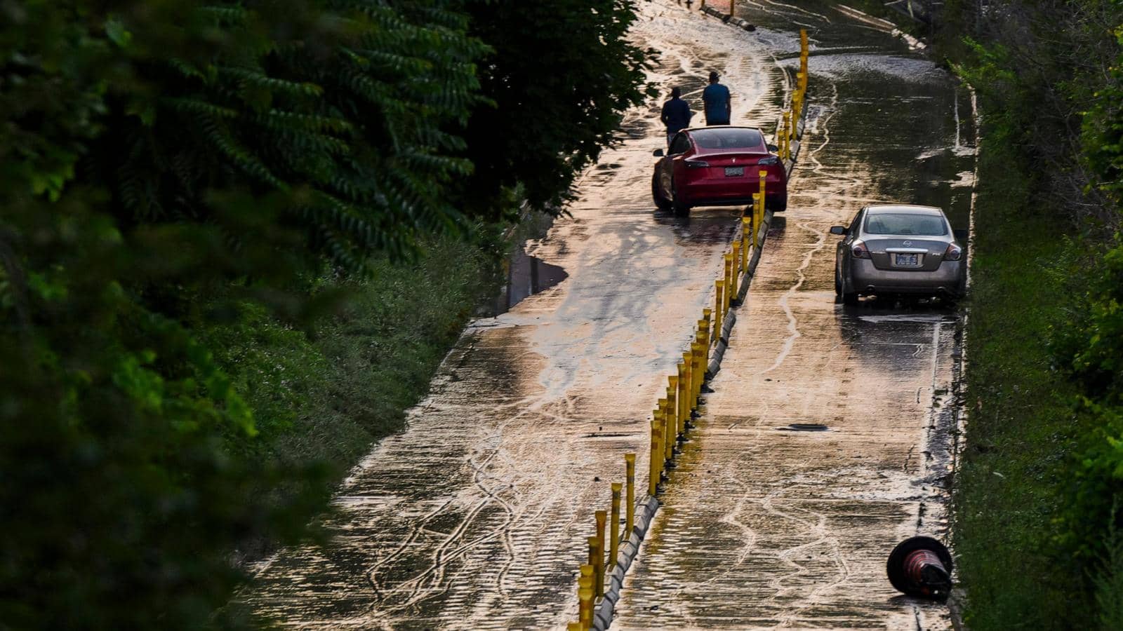 Water rescues underway in Arkansas after a new wave of storms across US and Canada