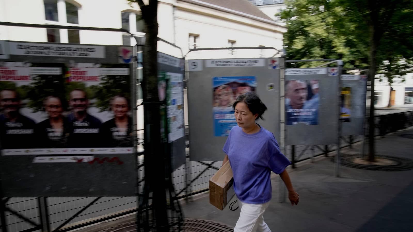 The Latest | Polls are open in France’s early legislative election