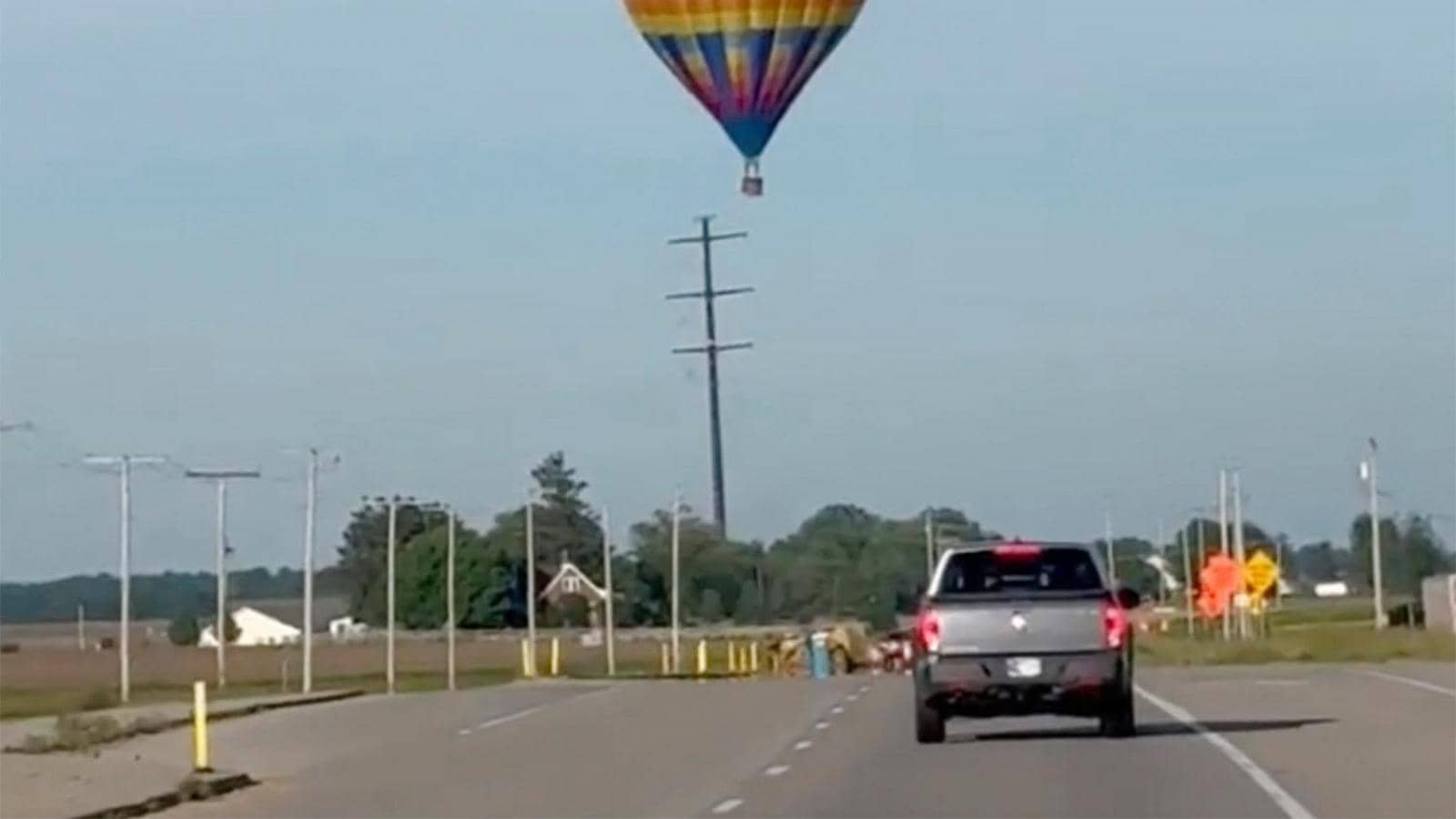 Hot air balloon struck Indiana power lines, burning three people in basket